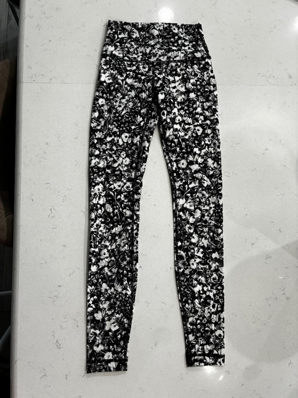 Like new lululemon leggings, size 4 , black and white print